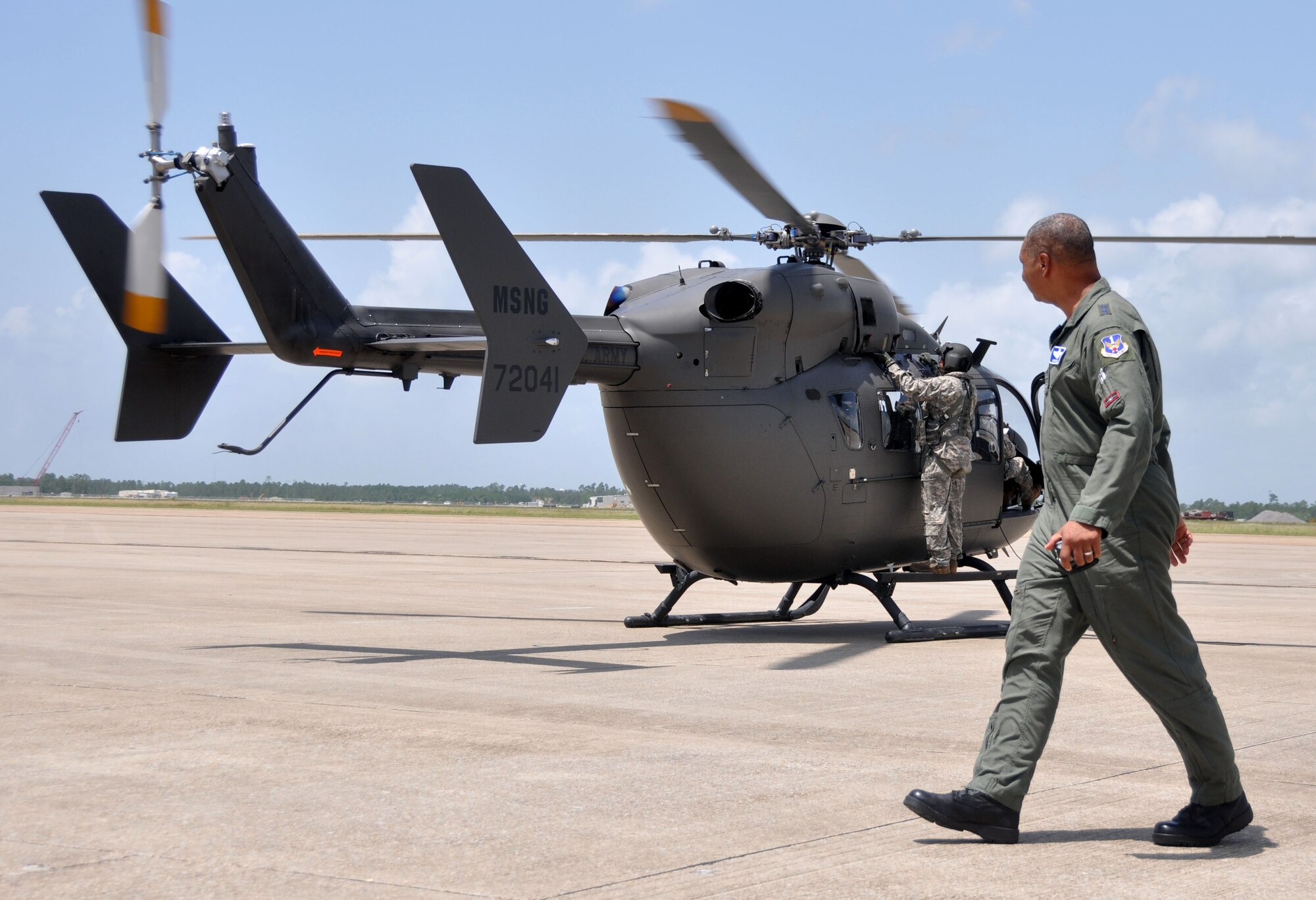 Maj. Gen. Garry C. Dean, Air Forces Northern commander, exits a UH-72 Lakota helicopter at Keesler Air Force Base, Miss., after participating in a recent reconnaissance flight of the Mississippi Gulf Coast during Deepwater Horizon response efforts.  (Mississippi Army National Guard photo by Casey Ware)