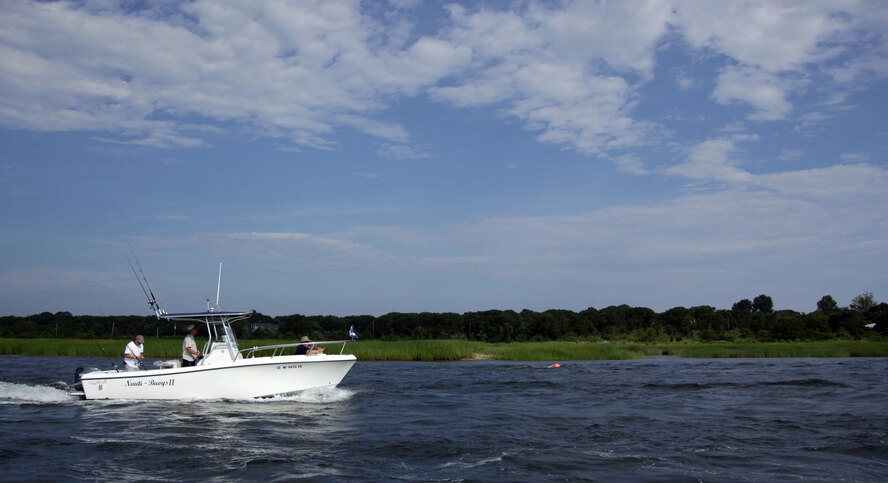 The Smithtown Bay Yacht Club hosted the second annual Soldiers on the Sound fishing trip on July 24, 2010 in Smithtown, N.Y. Members of the 106th Rescue Wing, from F.S. Gabreski Air National Guard Base, were the majority of participants for the event which paired the Airmen with civilians who took them on their boat to fish. The main fish the members sought to catch was the fluke. Out of the 18 boats which were deployed for the event only four regulation size fish were caught. The winning fluke was caught by SSgt. Derek Wallace, 106th Vehicle Maintenance, and it measured 4 lbs 3 ounces. 

(Official U.S. Air Force photo/SSgt David J. Murphy/released)
