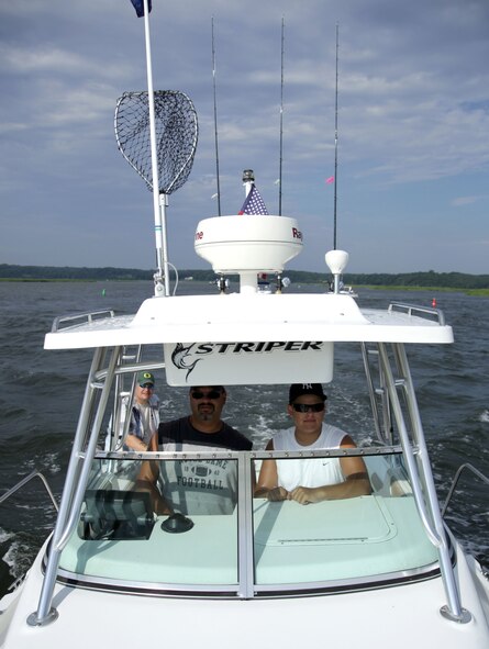 Joe Santospirito and his son Joe, pilot the "Sea Spirit" with Tech Sgt. Nate Dean and Staff Sgt. David J. Murphy on board. The Smithtown Bay Yacht Club hosted the second annual Soldiers on the Sound fishing trip on July 24, 2010 in Smithtown, N.Y. Members of the 106th Rescue Wing, from F.S. Gabreski Air National Guard Base, were the majority of participants for the event which paired the Airmen with civilians who took them on their boat to fish. The main fish the members sought to catch was the fluke. Out of the 18 boats which were deployed for the event only four regulation size fish were caught. The winning fluke was caught by SSgt. Derek Wallace, 106th Vehicle Maintenance, and it measured 4 lbs 3 ounces. 

(Official U.S. Air Force photo/SSgt David J. Murphy/released)
