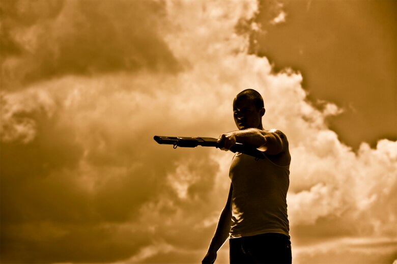 UNDER A GUNMAN'S GAZE - Photo illustration of a gunman about to go on a rampage (Photo by TSgt Samuel Bendet)