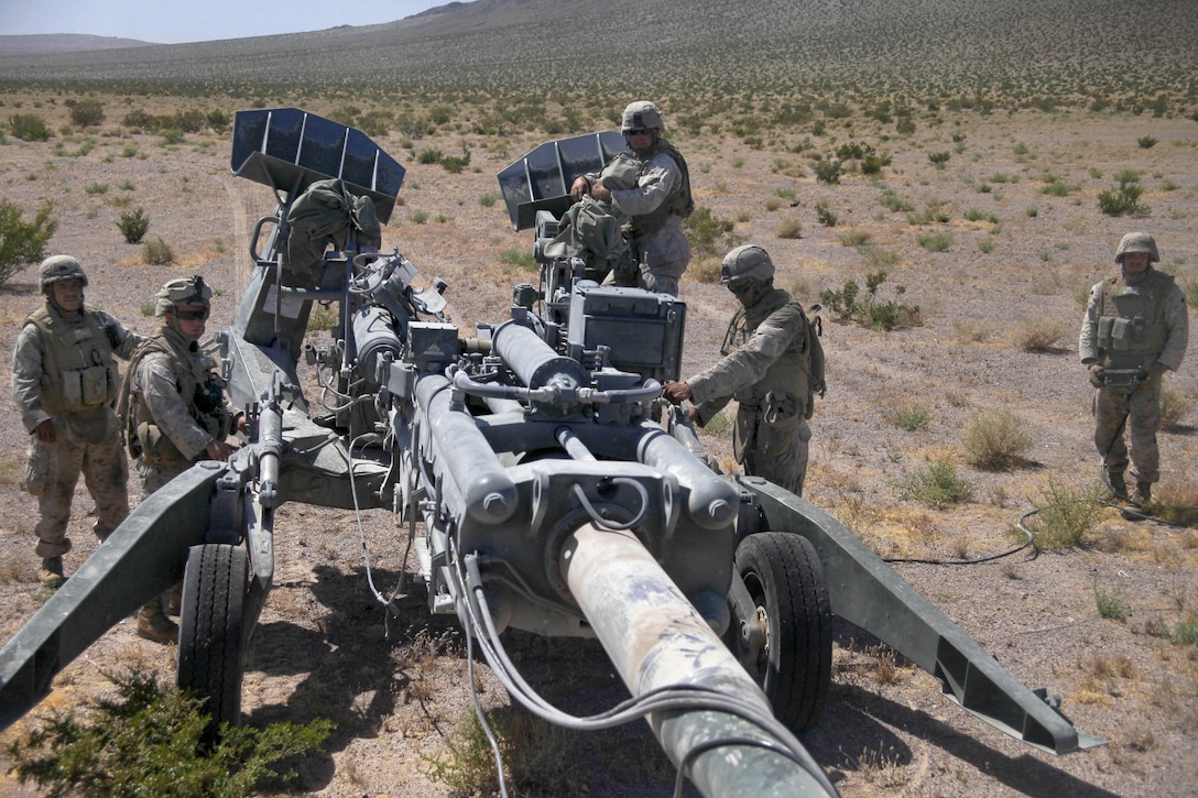 U.S. Marines prepare to move an M777 howitzer in support of 3rd ...