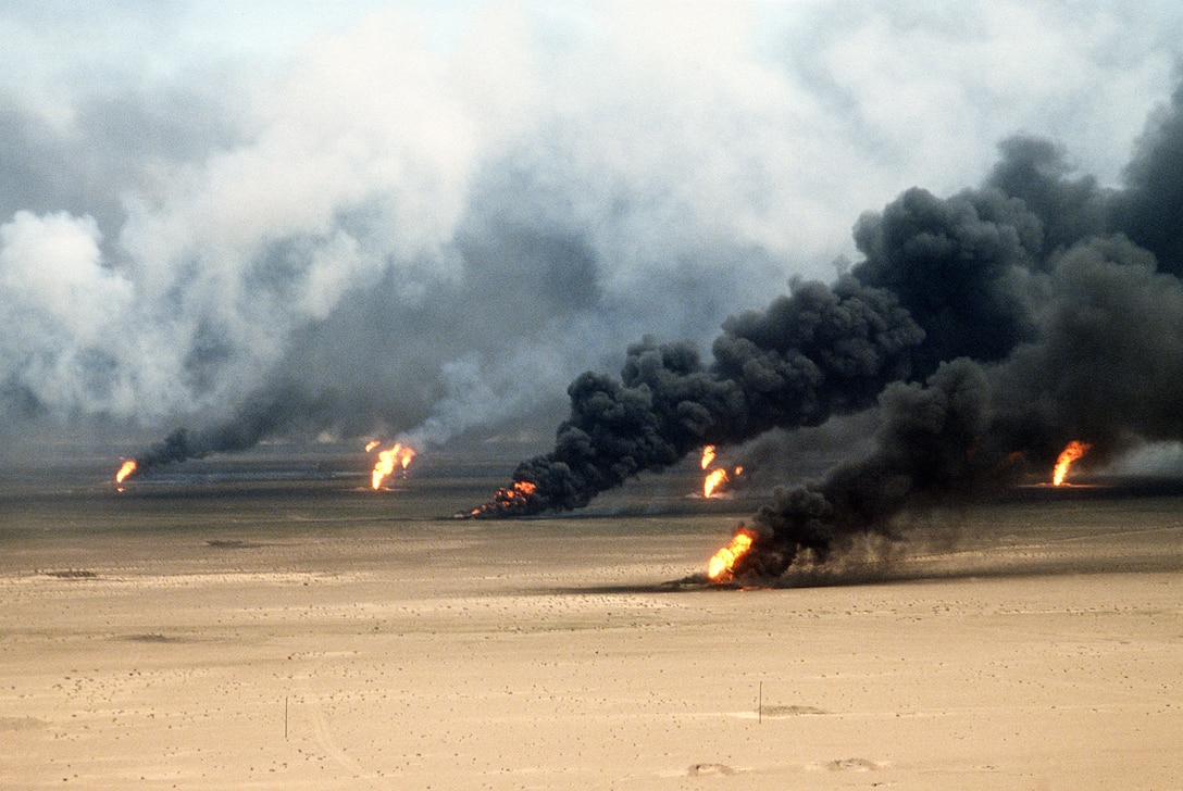 Oil well fires rage outside Kuwait City in the aftermath of Operation Desert Storm.  The wells were set on fire by Iraqi forces before they were ousted from the region by coalition force.