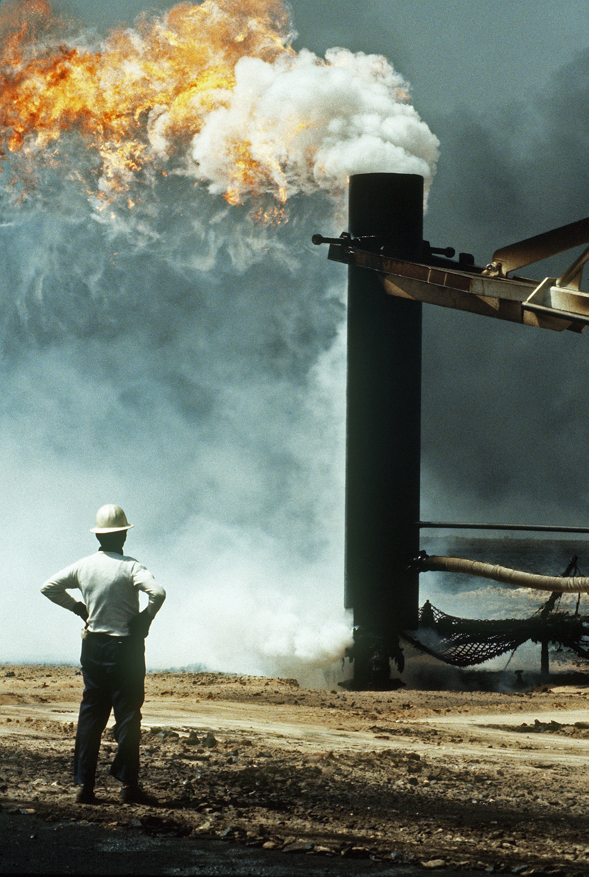 Firefighters from the Boots and Coots Oil Well Firefighting Company use ...