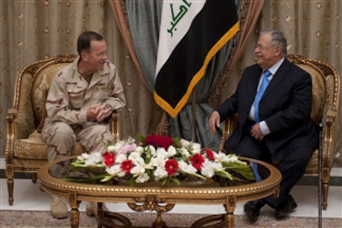 Chairman of the Joint Chiefs of Staff Adm. Mike Mullen, U.S. Navy, meets with Iraqi President Jalal Talabani in Baghdad on July 27, 2010.  Mullen's final stop in Iraq wraps up the ten-day around the world trip to meet with counterparts and troops engaged in the war on terrorism.  
