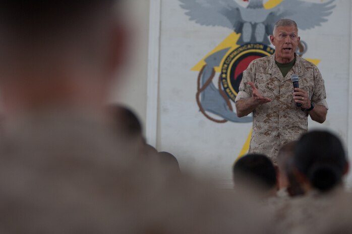 General James T. Conway, the 34th Commandant of the Marine Corps, answers a Marine's question during a town hall discussion at Floyd Bennett Field, Brooklyn, N.Y., July 29. He became the first commandant to visit 6th Communications Battalion's headquarters. The Marine battalion was relocated from Fort Schuyler, Bronx to Floyd Bennett Field in 1997.(Official Marine Corps photo by Sgt. Randall A. Clinton / RELEASED)