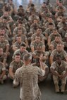 General James T. Conway, the 34th Commandant of the Marine Corps, answers a Marine's question during a town hall discussion at Floyd Bennett Field, Brooklyn, N.Y., July 29. He became the first commandant to visit 6th Communications Battalion's headquarters. The Marine battalion was relocated from Fort Schuyler, Bronx to Floyd Bennett Field in 1997.(Official Marine Corps photo by Sgt. Randall A. Clinton / RELEASED)