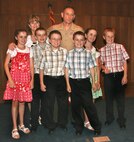 Brigadier General Frank Kelley, Commander, Marine Corps Systems Command, and his family at the Commander's promotion ceremony.