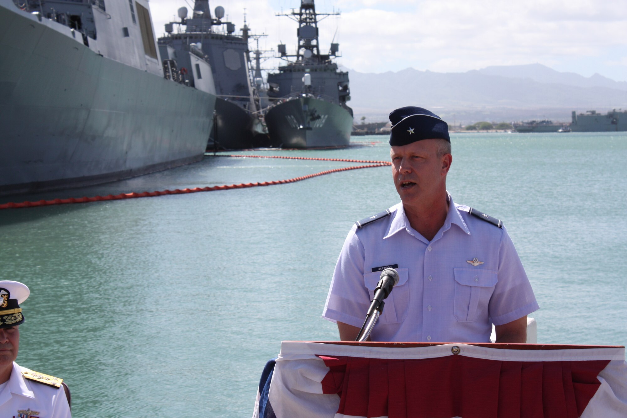 Brig. Gen. Thomas P. Harwood II, mobilization assistant to the commander, Thirteenth Air Force, and the combined forces air component commander for RIMPAC 2010, speaks to the media during the closing press conference for RIMPAC 2010 at Joint Base Pearl Harbor Hickam, Hawaii, on June 23, 2010. The Rim of the Pacific Exercise is the world's largest international maritime exercise that prepares forces to be interoperable and ready for a wide range of potential operations. The 613th Air and Space Operations Center at JBPH served as the central hub for data and voice communications during the biennial exercise which was held in the Hawaii operating area from June 23 through July 30. (U.S. Air Force photo/ Master Sgt. Victoria Meyer) 