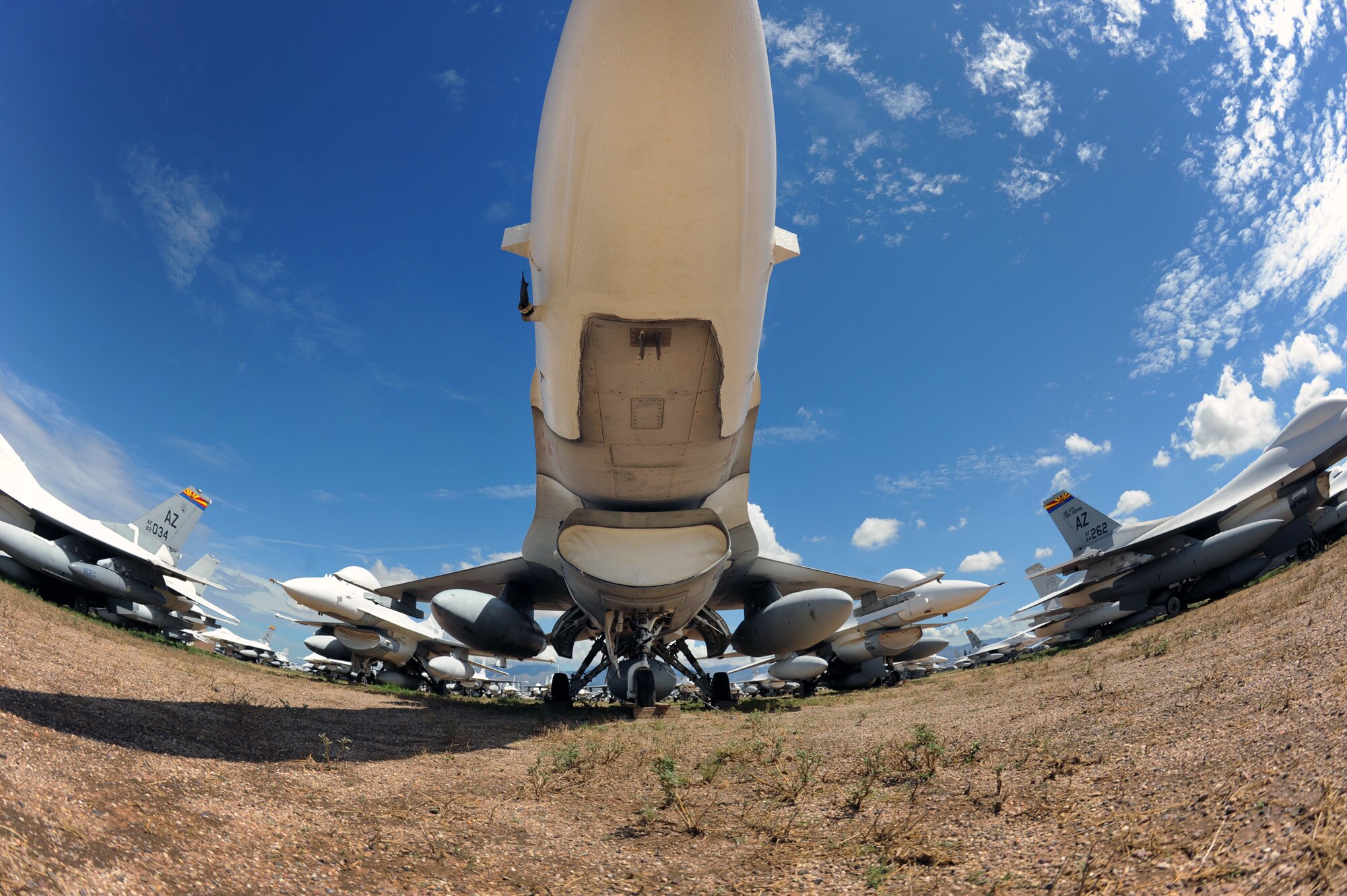 “Mothballed” F-16 Fighting Falcons are parked in the "bone yard" at Davis-Monthan Air Force Base, Ariz. Maintainers from the 309th Aerospace Maintenance and Regeneration Group are regenerating F-16s so they can be converted into usable manned or drone targets allowing Airmen to train and test new weapons platforms.  (U.S. Air Force photo/Staff Sgt. Desiree N. Palacios)