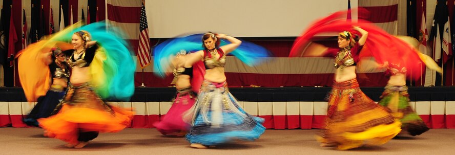 BARKSDALE AIR FORCE BASE, La. – Members of the Port Belly Project, a local belly-dancing group, perform for the Barksdale community during the third annual Multicultural Day event held at Hoban Hall July 30. Other performers included the Red River Pipes and Drums, Gems of Cairo and Native American dancers. (U.S. Air Force photo by Senior Airman Joanna M. Kresge)
