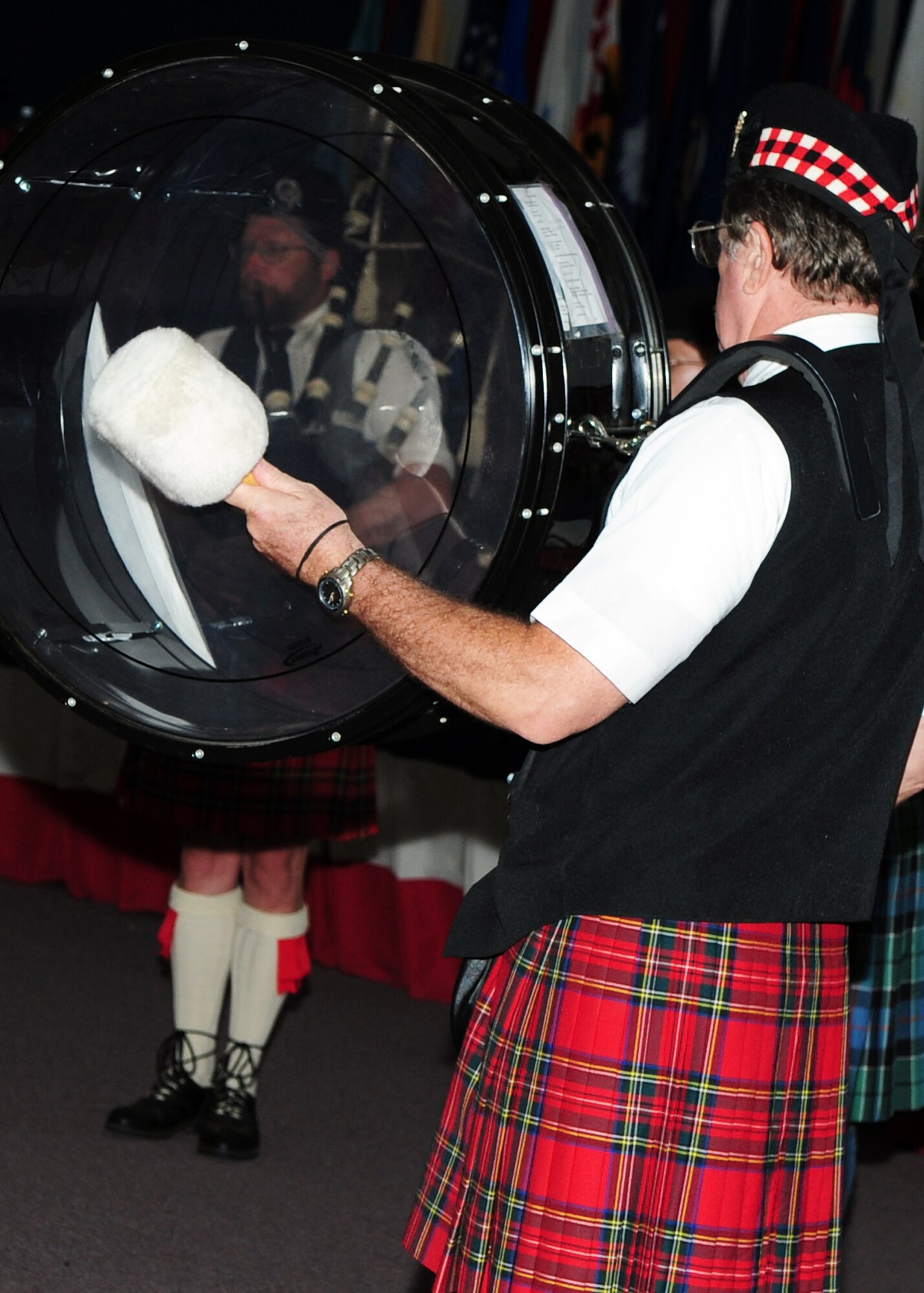 BARKSDALE AIR FORCE BASE, La. – Members of the Red River Pipes and Drums perform for crowds of Airmen and their families during the third annual Barksdale Multicultural Day held at Hoban Hall July 30. Other performers included the Port Belly Project, Gems of Cairo and Native American dancers. (U.S. Air Force photo by Senior Airman Joanna M. Kresge)