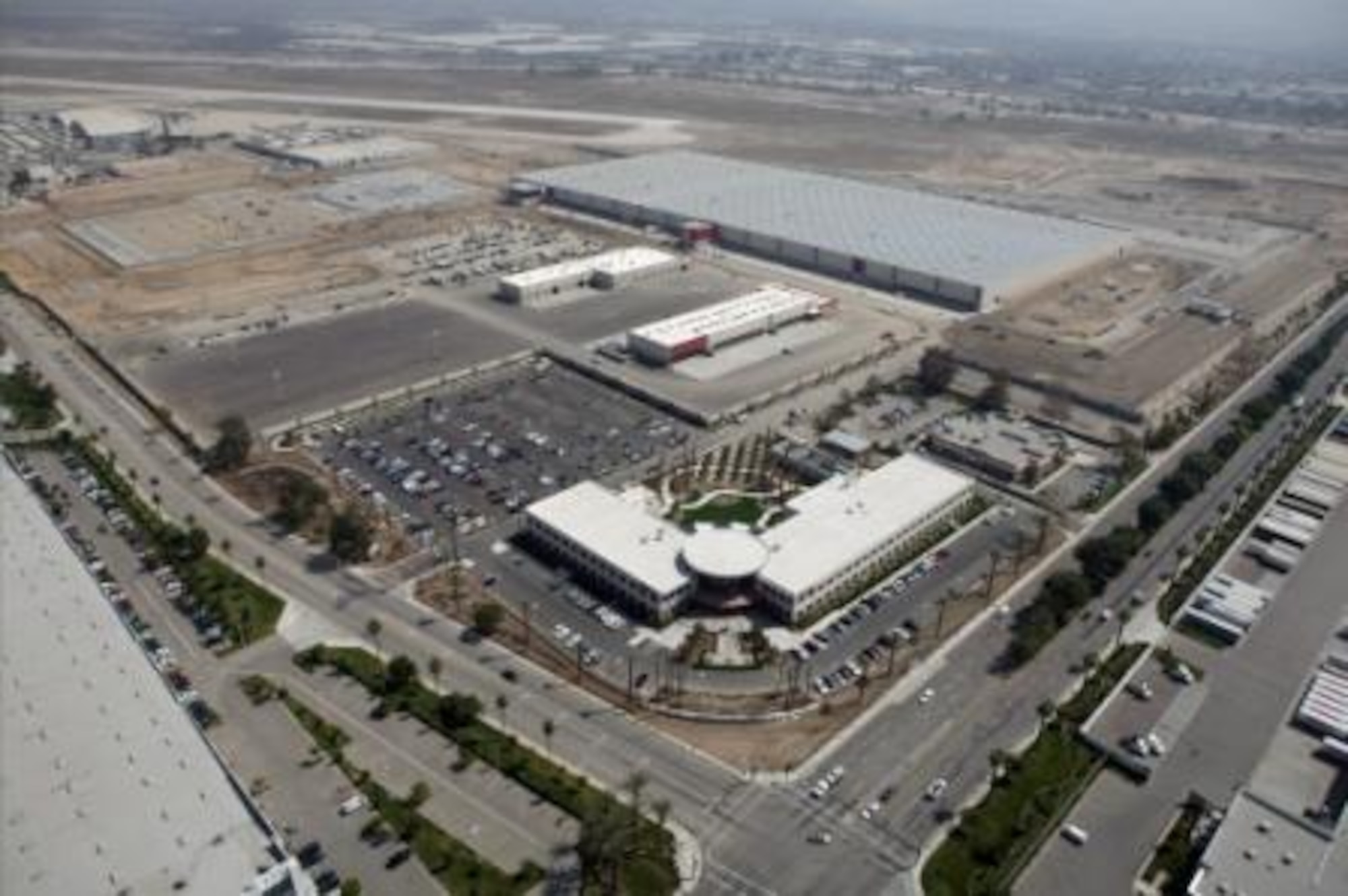 Built on the site of the former Norton Air Force Base headquarters, the Stater Brothers complex is the largest food distribution center in America - 2.1 million square feet under one roof.  Air Force Real Property Agency deeded the property to the Inland Valley Development Agency, which negotiated an agreement with Stater Bros. and master developer, Hillwood.