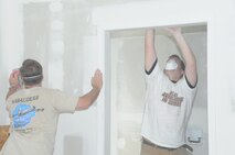 Airmen from the 916th Air Refueling Wing volunteer their time to support Habitat for Humanity in late July. (USAF photo by SSgt. Terrica Jones, 916ARW/PA)