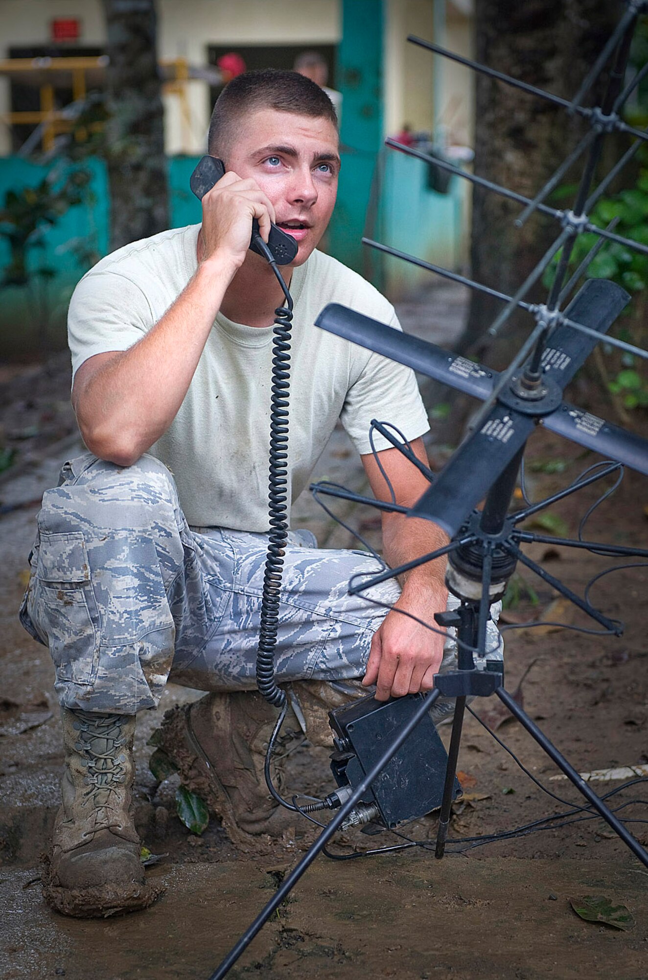 Airman 1st Class Jeffery Westmoreland, deployed from the 32nd Combat Communications Squadron, radios personnel movements to the tactical operations center during New Horizons Panama 2010. (U.S. Air Force photo/Tech. Sgt. Sean Worrell)