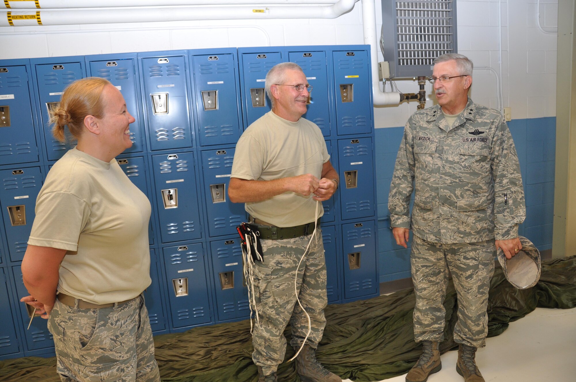 Maj. Gen. Martin M. Mazick, (right) Air Force Reserve vice commander, visits with Master Sgt. Gary Scheff and Tech. Sgt. Jessica Kosmosky, 27th Aerial Port Squadron, during his visit here July 20.  The general toured 934th Airlift Wing facililities while he was in town speaking at the AFR Public Affairs conference. (Air Force Photo/Master Sgt. Paul Zadach)
