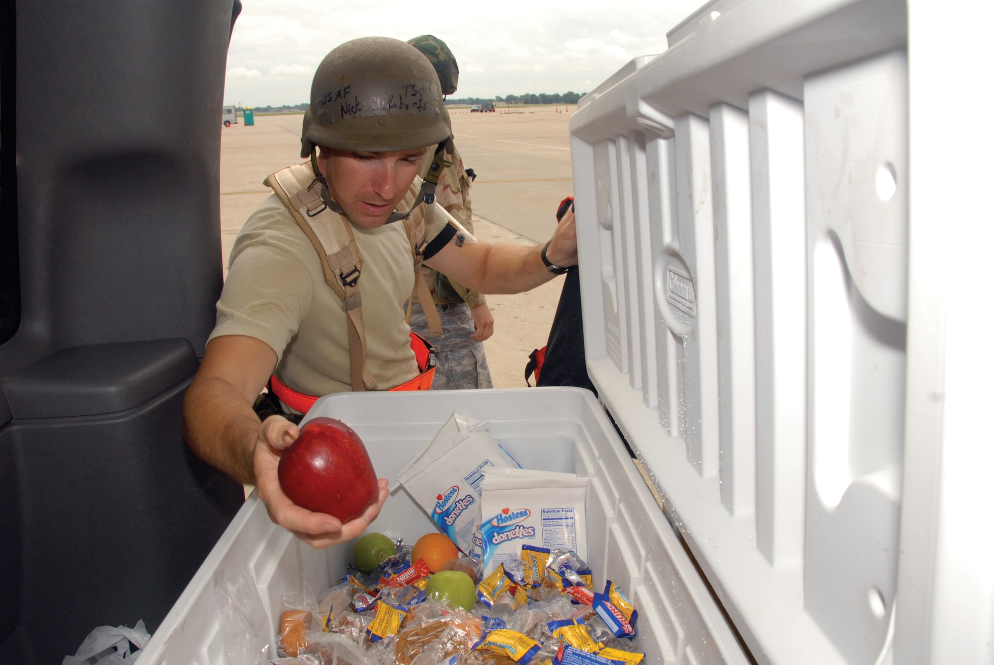 Tech. Sgt. Nick McRoberts, 442nd Fighter Wing crew chief, chooses a snack offered by the first sergeants during the operational readiness exercise July 8, 2010. The 442nd FW is an Air Force Reserve unit at Whiteman Air Force Base, Mo. (U.S. Air Force photo/Senior Airman Danielle Wolf)