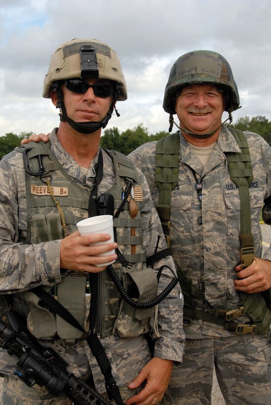 Master Sgt. Robert Reeves, 442nd Security Forces Squadron, drinks a cup of coffee and talks to 1st Sgt. (Senior Master Sgt.) Kenneth Koyles during an operational readiness exercise July 8. The 442nd SFS is part of the 442nd Fighter Wing, an Air Force Reserve unit at Whiteman Air Force Base, Mo. (U.S. Air Force photo/Senior Airman Danielle Wolf)