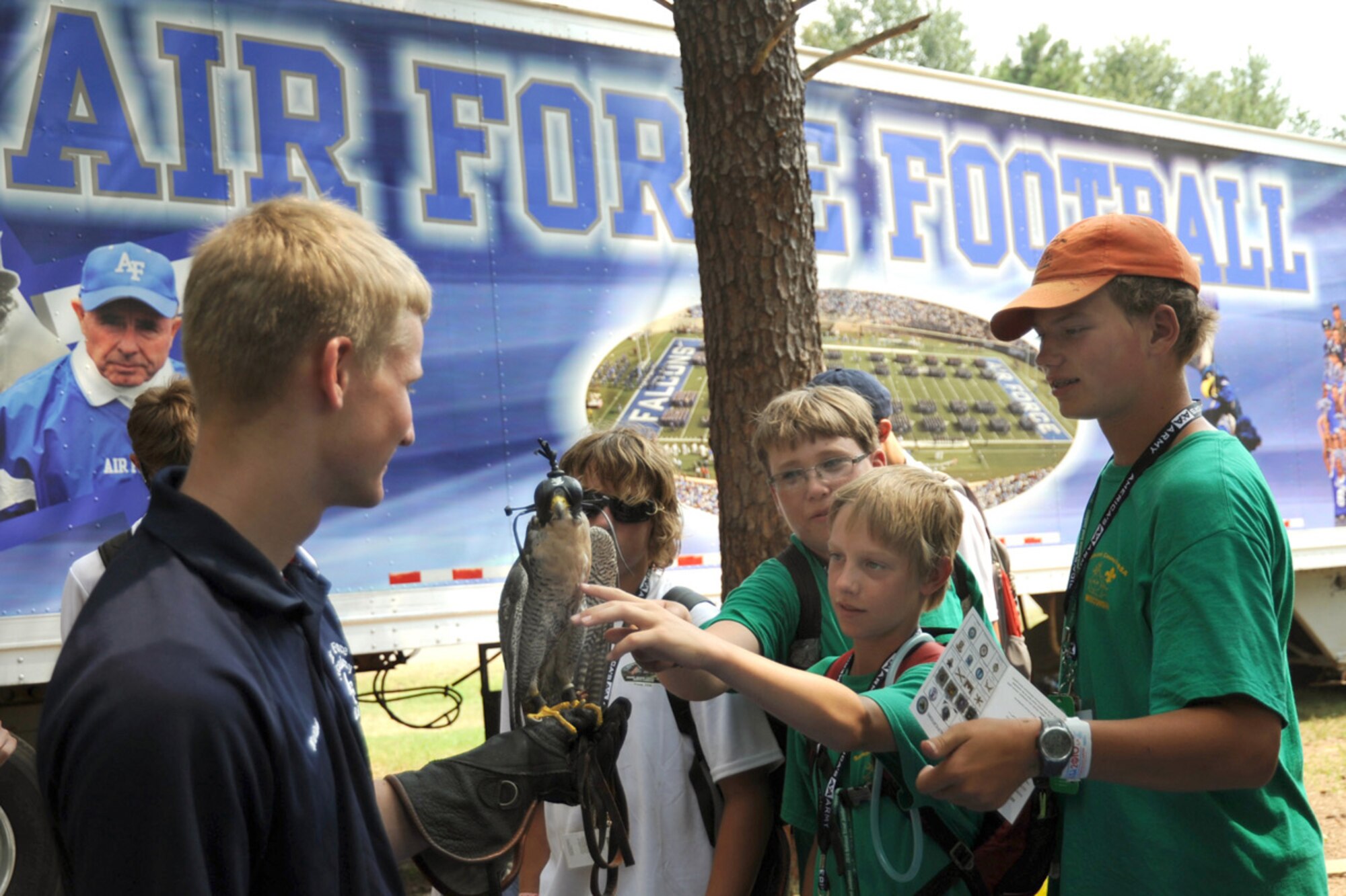 Air Force Academy Cadet Nathan Lebens shows Academy mascot Havoc, a 14-year-old peregrine falcon, to Boy Scouts attending the 100th National Scout Jamboree taking place at Fort A.P. Hill, Va., July 26 through Aug. 4. Approximately 46,000 Boy Scouts are attending the Jamboree. (Department of Defense photo/Michael Tolzmann)