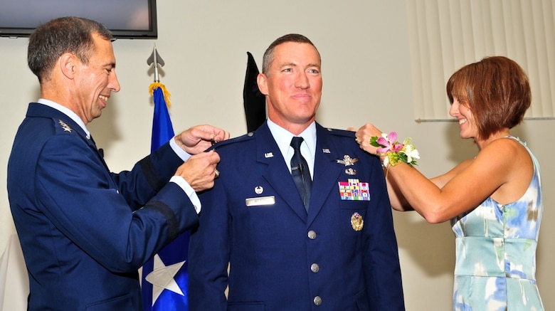 Lt. Gen. Larry James, 14th Air Force commander, was the presiding officer for Brig. Gen. Ed Wilson's, 45th Space Wing commander, promotion ceremony held July 23 at the Shark Center.  Gen. James and Gen. Wilson's wife, Lisa, officially pinned-on his new brigadier general stars in front of a large crowd, including local civic and community leaders, as well as numerous members of Gen. Wilson's extended family.  