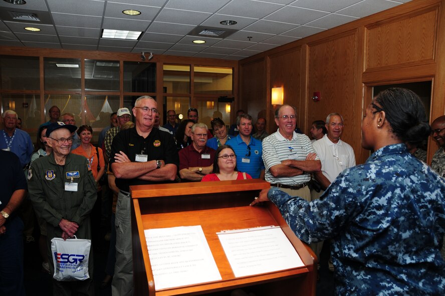 Niagara Falls Air Reserve Station, Niagara Falls, NY –U.S. Navy Cmdr. Aquilla Causey, Commander of the Buffalo Military Entrance Processing Station, answers questions the Employer Support of the Guard and Reserves had about the enlistment process for new military members during their visit July 29, 2010. ESGR is a Department of Defense agency that promotes public and private understanding of the National Guard and Reserve in order to gain employer and community support. (U.S. Air Force photo by Senior Airman Jessica Mae Snow) 

