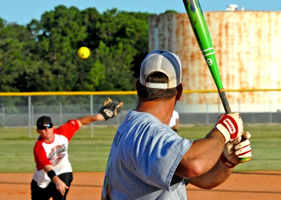 Travis Holcomb, 96th Security Force Squadron, pitches to a batter from the 96th Logistics Readiness Squadron, during an intramural softball playoff game July 27 at Eglin’s Foster Stadium.  SFS lost to 96th Logistics Readiness Squadron 22-18.  (U.S. Air Force photo/Tech Sgt. Cheryl Foster.)  