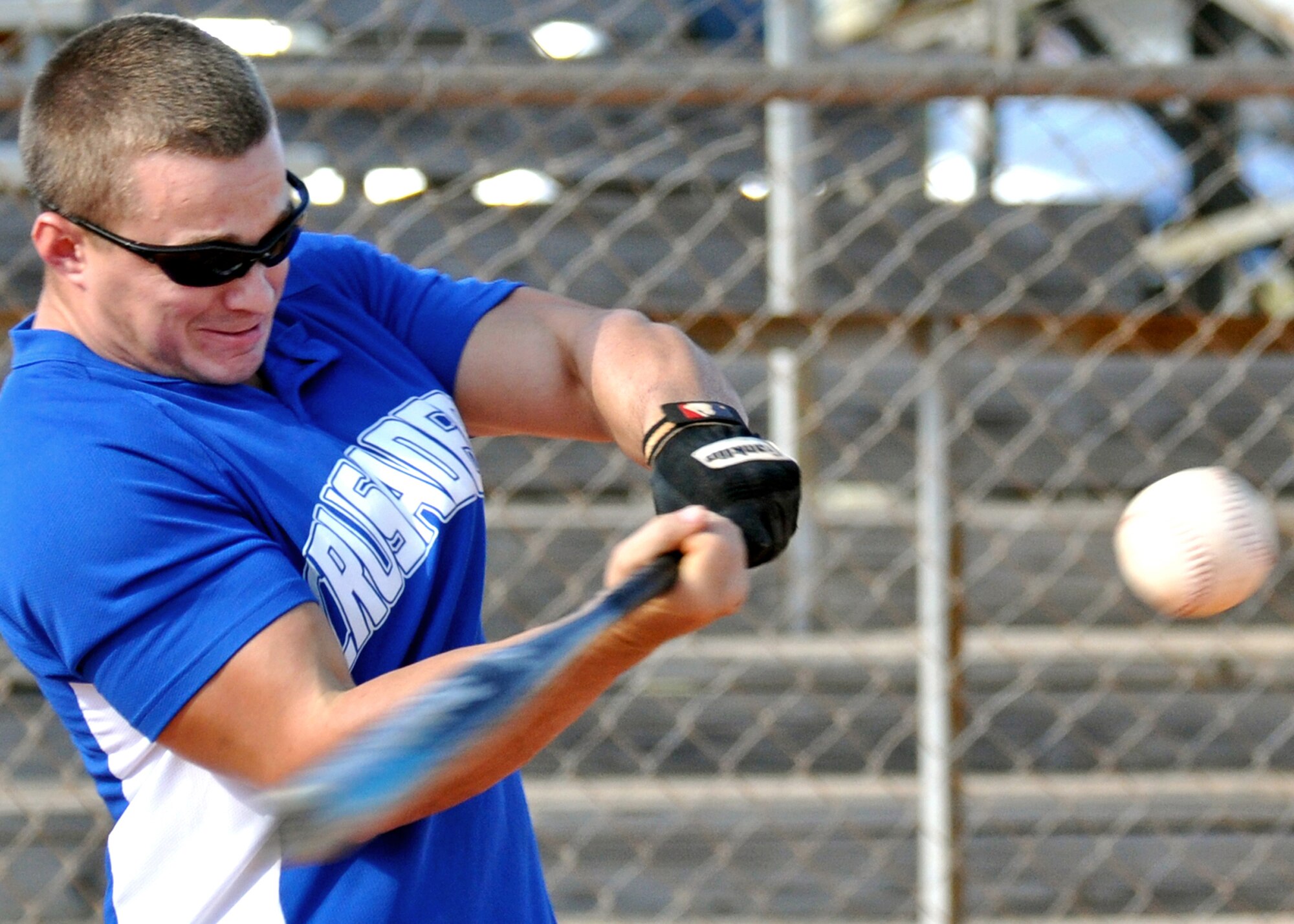 K.J. Washausen, 46th Test Wing, swings for the fence during an intramural softball playoff game July 28 at Eglin’s Foster Stadium.  The 46th fell to the 96th Logistics Readiness Squadron, 8-3, who advanced to the championship game Aug. 2.  (U.S. Air Force photo/Tech Sgt. Cheryl Foster.)   