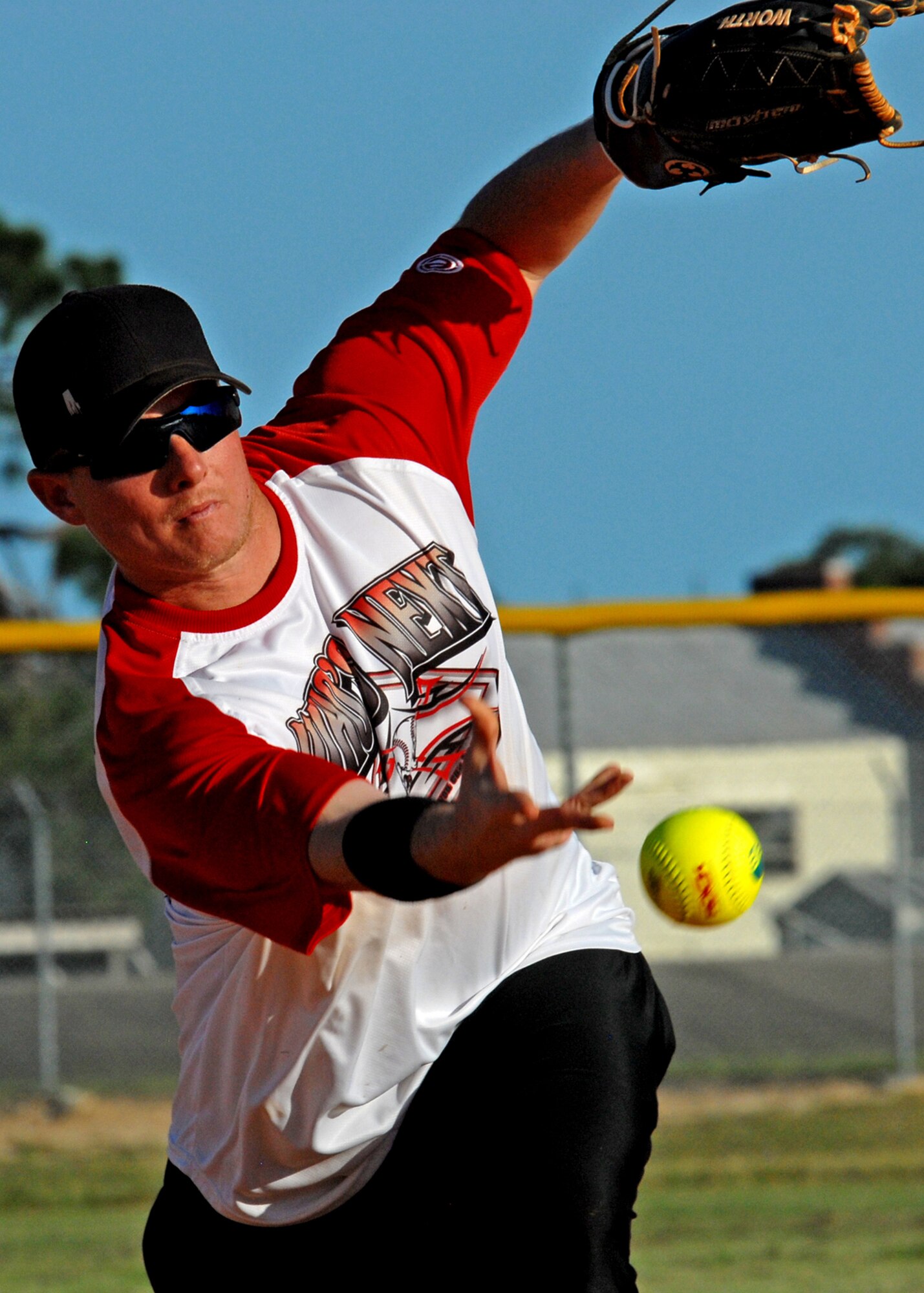 Travis Holcomb, 96th Security Forces Squadron, pitches for his team during an intramural softball playoff game July 27 at Eglin’s Foster Stadium.   SFS lost to 96th Logistics Readiness Squadron 22-18. (U.S. Air Force photo/Tech Sgt. Cheryl Foster.)  