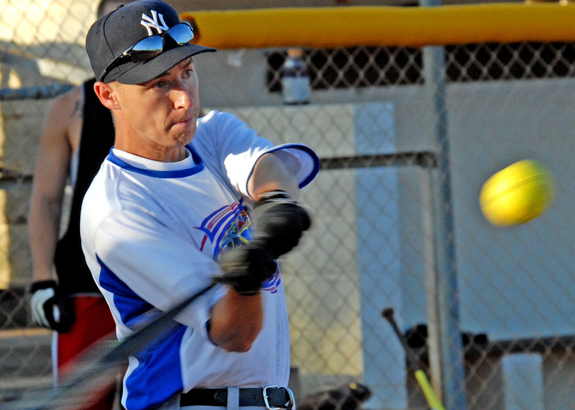 James Swann, 96th Security Forces Squadron, swings away during an intramural softball playoff game July 28 at Eglin’s Foster Stadium.  SFS lost to 96th Logistics Readiness Squadron 22-18. (U.S. Air Force photo/Tech Sgt. Cheryl Foster.)  