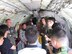 Korean media, AFN and 7th Air Force Airmen listen to boom operator Staff Sgt. Brian Porter of the 909th Air Refueling Squadron. The 909 ARS deployed to the peninsula in support of Invincible Spirit, July 26. (U.S. Air Force photo by Mr. Won Hui Kim)