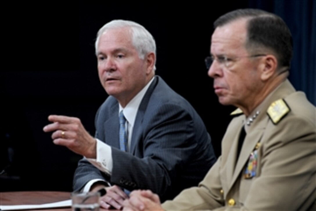 Secretary of Defense Robert M. Gates and Chairman of the Joint Chiefs of Staff Adm. Mike Mullen, U.S. Navy, conduct a joint press conference in the Pentagon on July 29, 2010.  The leak of many thousands of classified documents on the WikiLeaks website was the chief topic under discussion.  