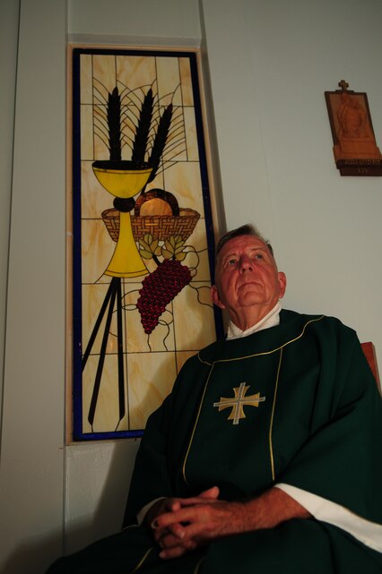 Lt. James Fulton Finley, station Roman Catholic chaplain, is the oldest sailor in the Navy. The 73-year-old Brooklyn, N.Y., native has been a man of the cloth for 47 years and supported the troops for more than 20 years.