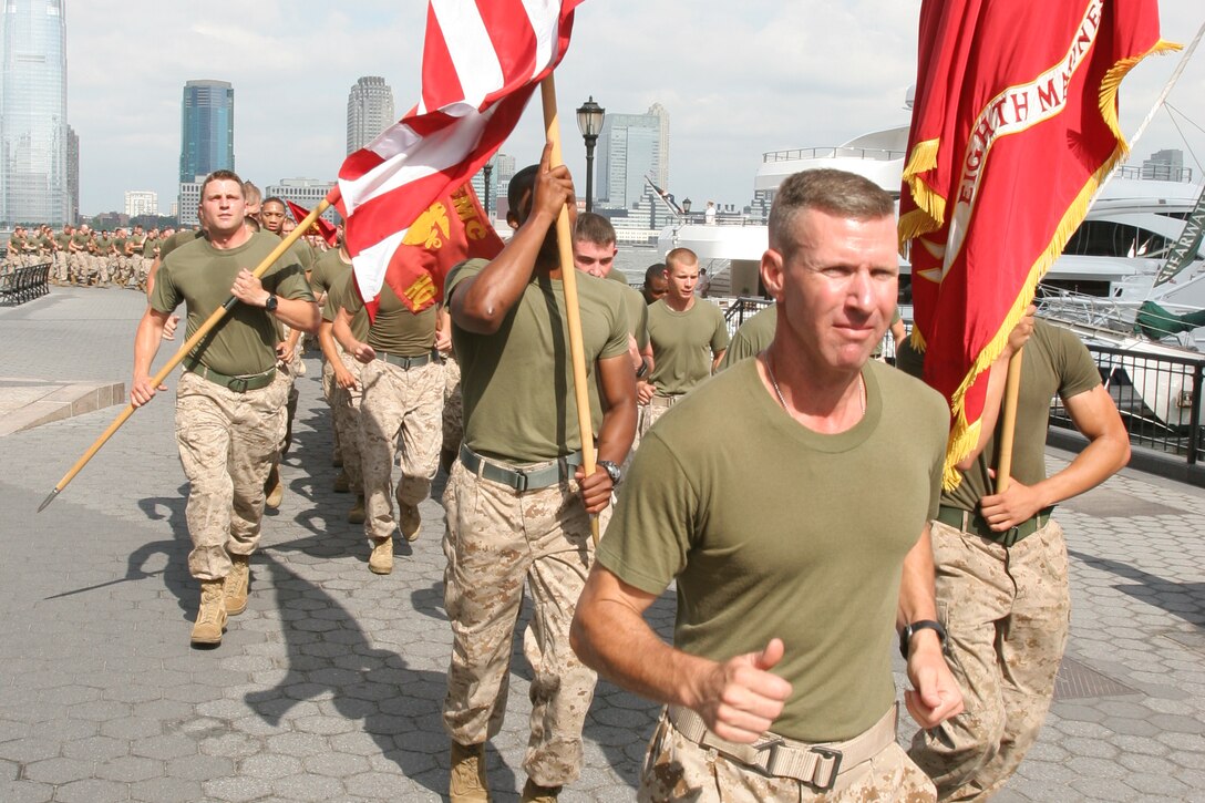 Approximately 400 Marines, Sailors, Coast Guardsmen, New York police and firefighter ran through downtown Manhattan, June 1, 2010, in honor of the victims of 9/11 and America's fallen heros.   More than 3,000 Marines, Sailors and Coast Guardsmen are in the area participating in community outreach events and equipment demonstrations May 26 - June 2. This is the 26th year New York City has hosted the sea services for Fleet Week.