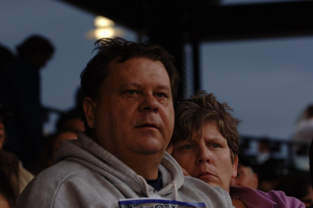 ELLSWORTH AIR FORCE BASE, S.D. - Tony Lake, 28th Force Support Squadron deputy commander, and Judy Bargo, 28 FSS bowling center manager, watch as a Colorado Rockies player is struck by the ball from an outside pitch, May 29. Mrs. Bargo said while this was her first Outdoor Recreation hosted trip, she is planning to attend more events as they are planned out.(U.S. Air Force photo/Airman 1st Class Jarad A. Denton)
