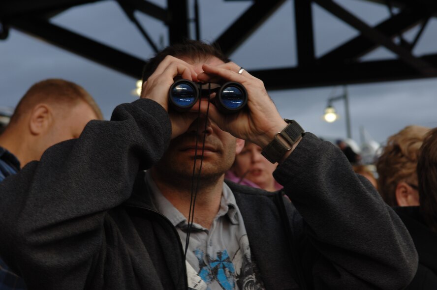 ELLSWORTH AIR FORCE BASE, S.D. - Master Sgt. Richard Platt, 28th Force Support Squadron first sergeant watches a Colorado Rockies baseball game through binoculars, May 29. Sergeant Platt was part of a group who attended the game as part of an Outdoor Recreation hosted activity.(U.S. Air Force photo/Airman 1st Class Jarad A. Denton)
