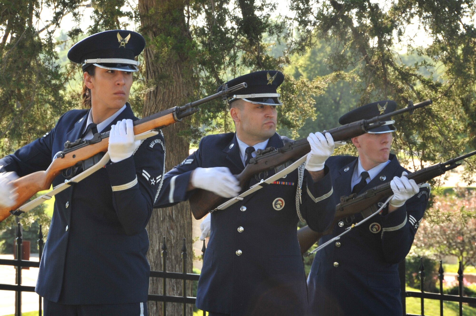 OFFUTT AIR FORCE BASE, Neb. -- Members of the Offutt Honor Guard fire off one of three volleys during Offutt's Memorial Day ceremony at the base cemetery here May 31. More than 100 people attended the annual service. U.S. Air Force Photo by D.P. Heard