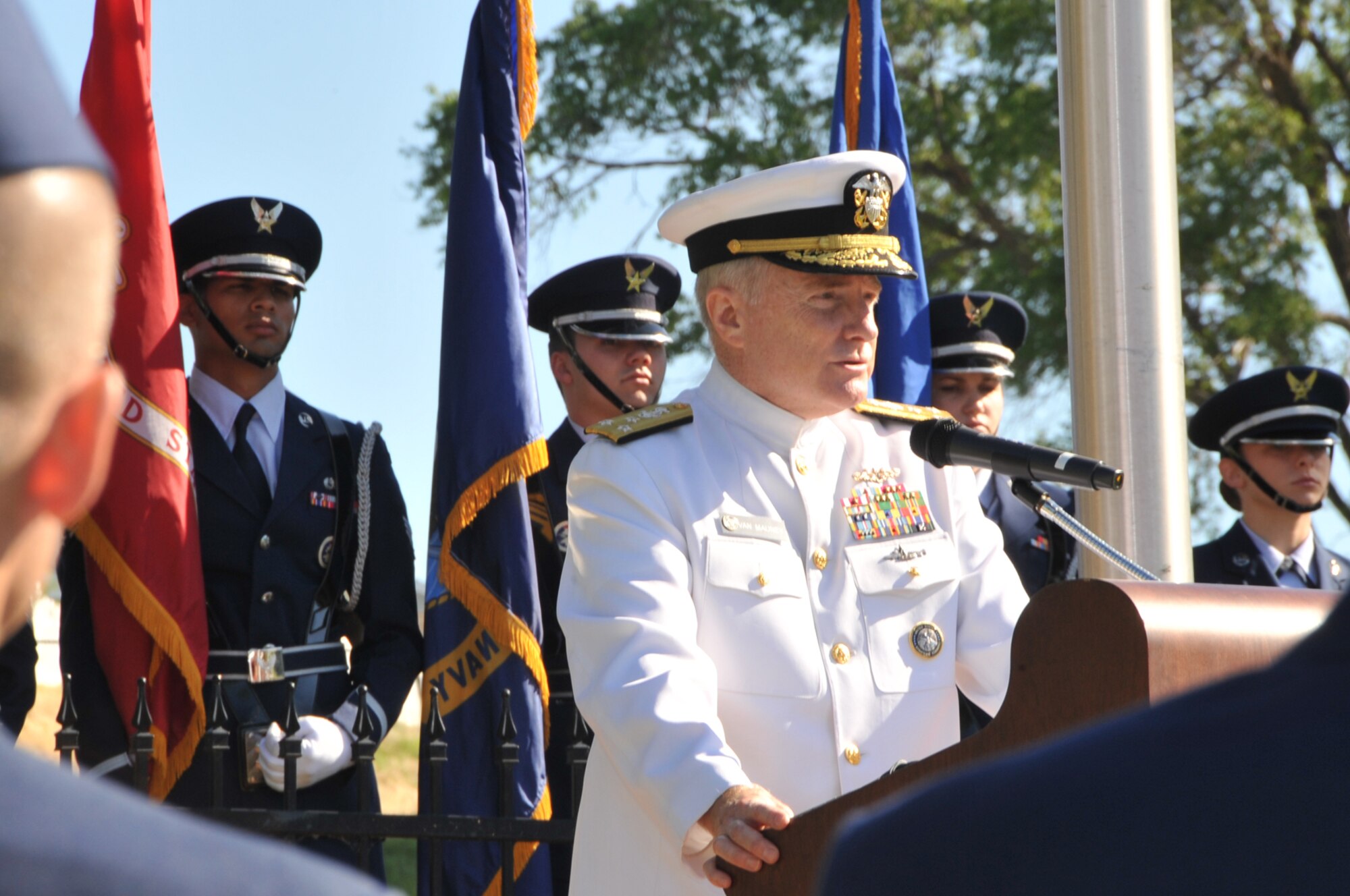 OFFUTT AIR FORCE BASE, Neb. -- Adm. Carl V. Mauney, deputy commander of U.S. Strategic Command, addresses a crowd of more than 100 people at the base cemetery here May 31 during Offutt's Memorial Day Ceremony.  Admiral Mauney was the guest speaker for the service. U.S. Air Force Photo by D.P. Heard