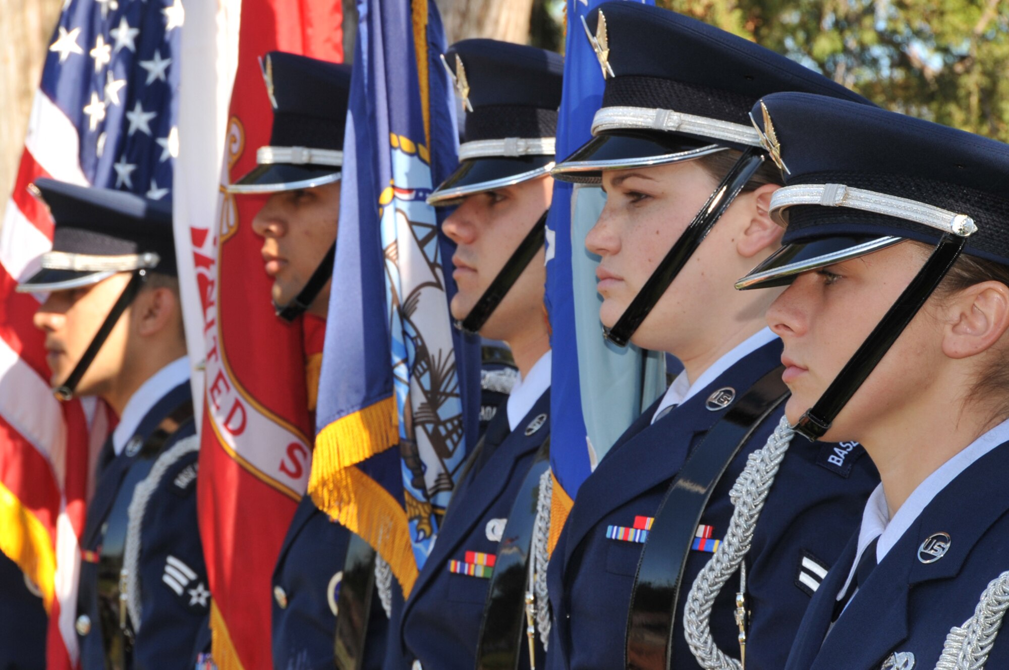OFFUTT AIR FORCE BASE, Neb. -- Members of the Offutt Honor Guard present the colors during Offutt's Memorial Day ceremony at the base cemetery May 31.  More than 100 people attended the annual memorial service. U.S. Air Force Photo by D.P. Heard