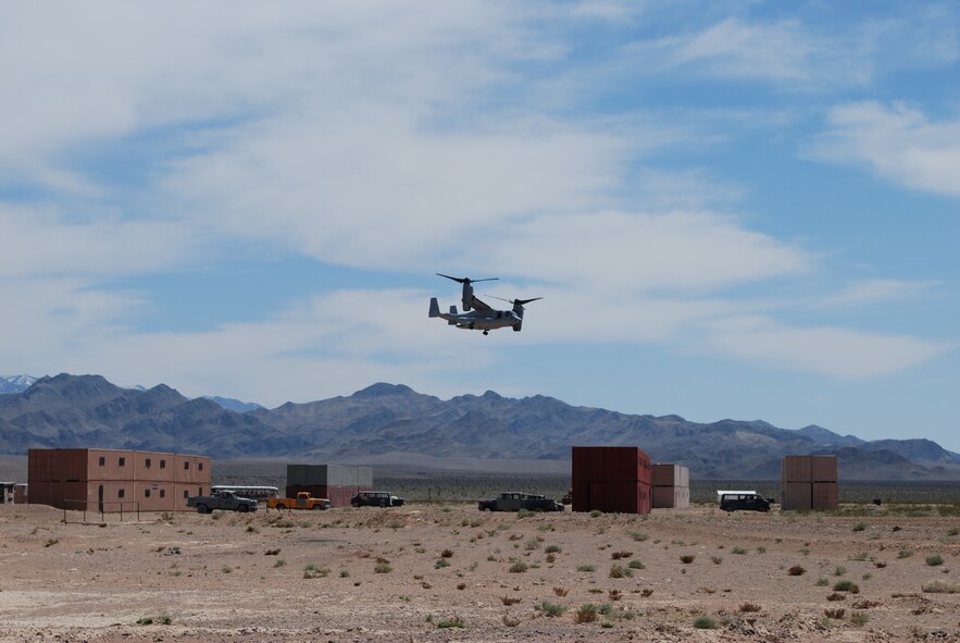 A Joint raid insertion team demonstrates the ability to receive target updates as their MV-22 Osprey approaches the insertion point over Nellis AFB, Nev., during the Joint Expeditionary Forces Experiment 2010, which took place April 12-23.  (Courtesy photo)

