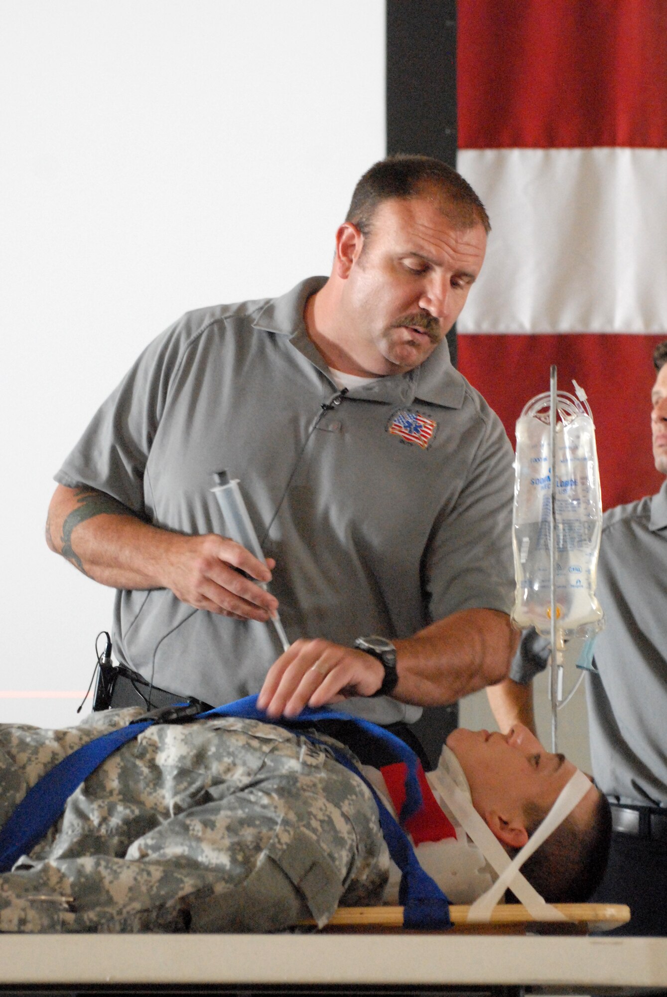 Pat Kelly, a Street Smart presenter, talks to a group of service member about the effects an automobile accident has had on Army Pfc. Albert Gomez’s body.  Members of Goodfellow were given the opportunity to experience the consequences of bad driving habits and receive information on other safety issues during the May 28 Safety Day which marked the start of 101 Critical Days of Summer. (U.S. Air Force photo/Master Sgt. Randy Mallard) 