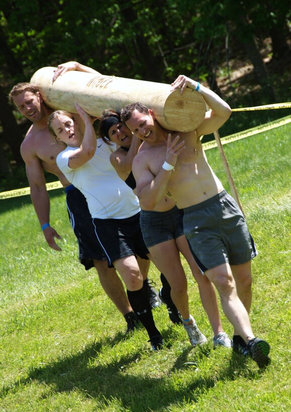 LOGAN, Ohio -- Members of the CrossFit Hampton Roads Affiliate Team execute a log carry at the North Central CrossFit Games Regional May 7. The team finished in fourth place, securing a spot at the 2010 CrossFit Games in Los Angeles, Calif., in July. (Courtesy photo)