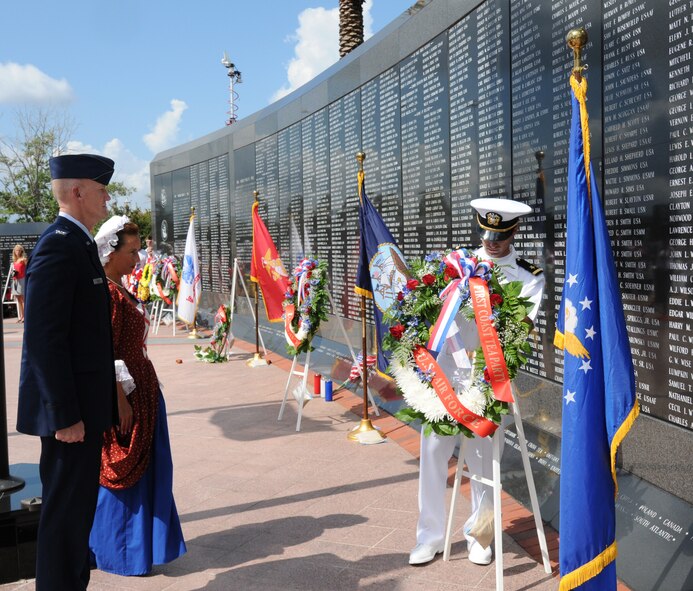 Colonel James O. Eifert, Vice Commander of the 125th Fighter Wing Jacksonville Fla., presents the Air Force wreath at a ceremony held on Memorial Day at the Jacksonville Veterans Memorial Wall. (Air National Guard photo by Staff Sgt. Jaclyn Carver)