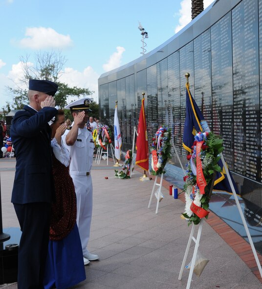 Colonel James O. Eifert, Vice Commander of the 125th Fighter Wing Jacksonville Fla., presents the Air Force wreath at a ceremony held on Memorial Day at the Jacksonville Veterans Memorial Wall. (Air National Guard photo by Staff Sgt. Jaclyn Carver)