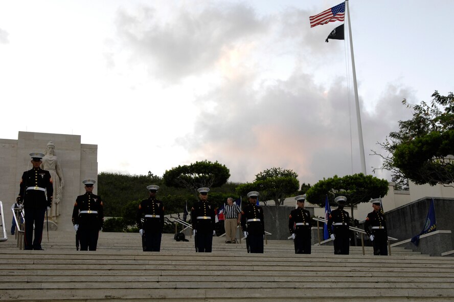 HONOLULU - U.S. Marines assigned to Marine Corps Forces Pacific Hawaii standby prior to conducting a 21-gun salute during a Vietnam Veteran and wreath laying ceremony on May 30 at the National Cemetery of the Pacific in the Pu'owaina Crater, also known as the Punchbowl in Honolulu, Hawaii.  (U.S.  Air Force photo/Tech Sgt. Cohen A. Young)
