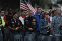 HONOLULU - Military veterans, motorcycle club members and  Vietnam veteran supporters standby during a candlelight vigil at the National Cemetery of the Pacific in the Pu'owaina Crater, also known as the Punchbowl, during a Vietnam Veteran and wreath laying ceremony on May 30.  (U.S.  Air Force photo/Tech Sgt. Cohen A. Young)