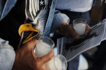 HONOLULU - A motorcycle enthusiast carries three candles that will be lit for a ceremonial lighting at the National Cemetery of the Pacific in the Pu'owaina Crater, also known as the Punchbowl during a Vietnam Veteran and wreath laying ceremony on May 30 in Honolulu, Hawaii.  (U.S.  Air Force photo/Tech Sgt. Cohen A. Young)