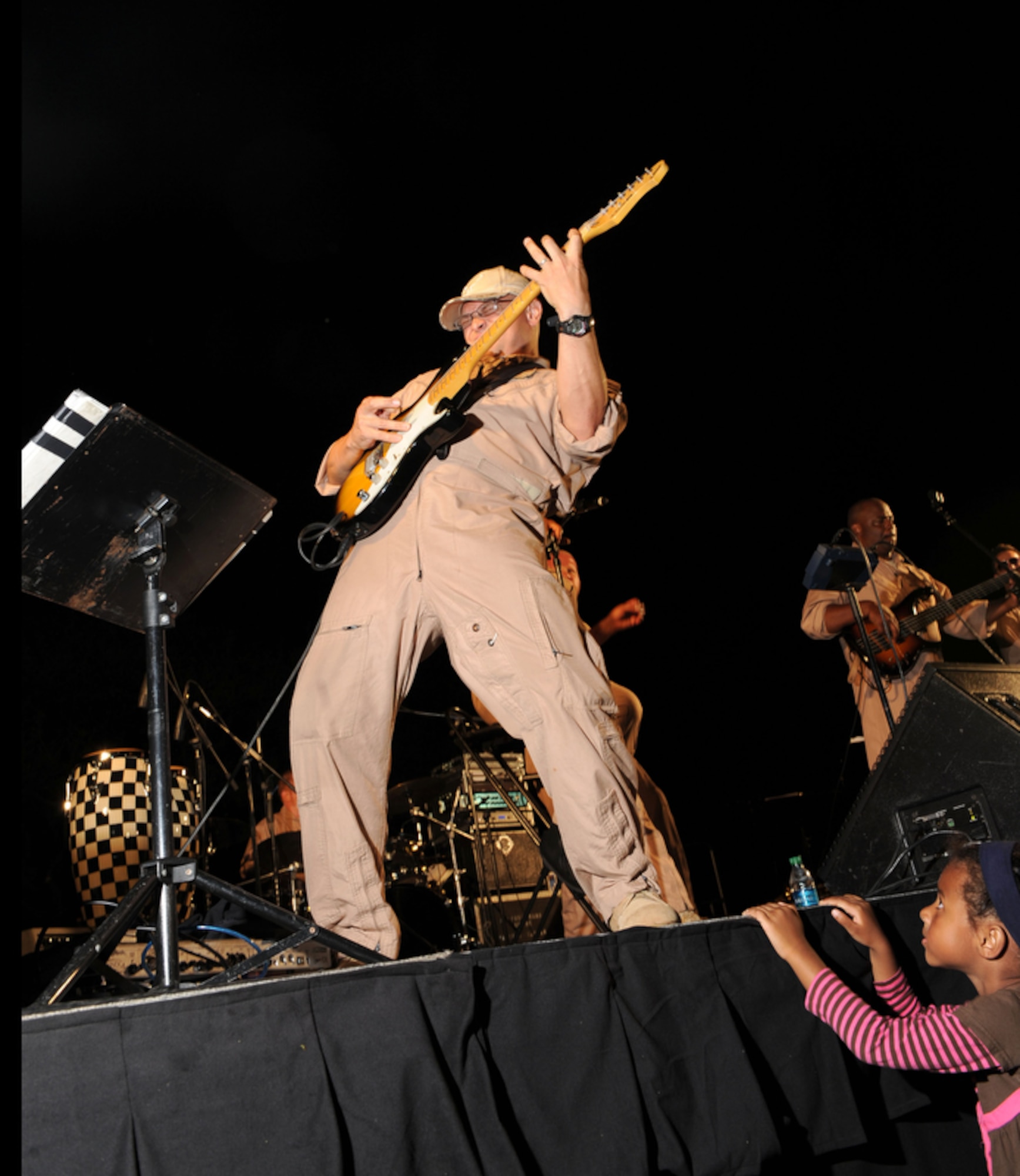 HONOLULU - Tech Sgt Greg Lacy of the U. S. Air Force Band of the Pacific - Hawaii, also known as "Hana Hou" performs in front of more than 400 onlookers during a Military Band Melee event at Ft DeRussy Park in Honolulu, Hawaii on May 29 as part of Military Appreciation Month and a prelude to Memorial Day events. The U.S. Army's 25th Infantry Division Band, the U. S. Navy Pacific Fleet Band, the Marine Corps Forces Pacific Band, the U.S. Air Force of the Band of the Pacific-Hawaii and the U.S. Coast Guard were all represented at the free concert. (U.S.  Air Force photo/Tech Sgt. Cohen A. Young)