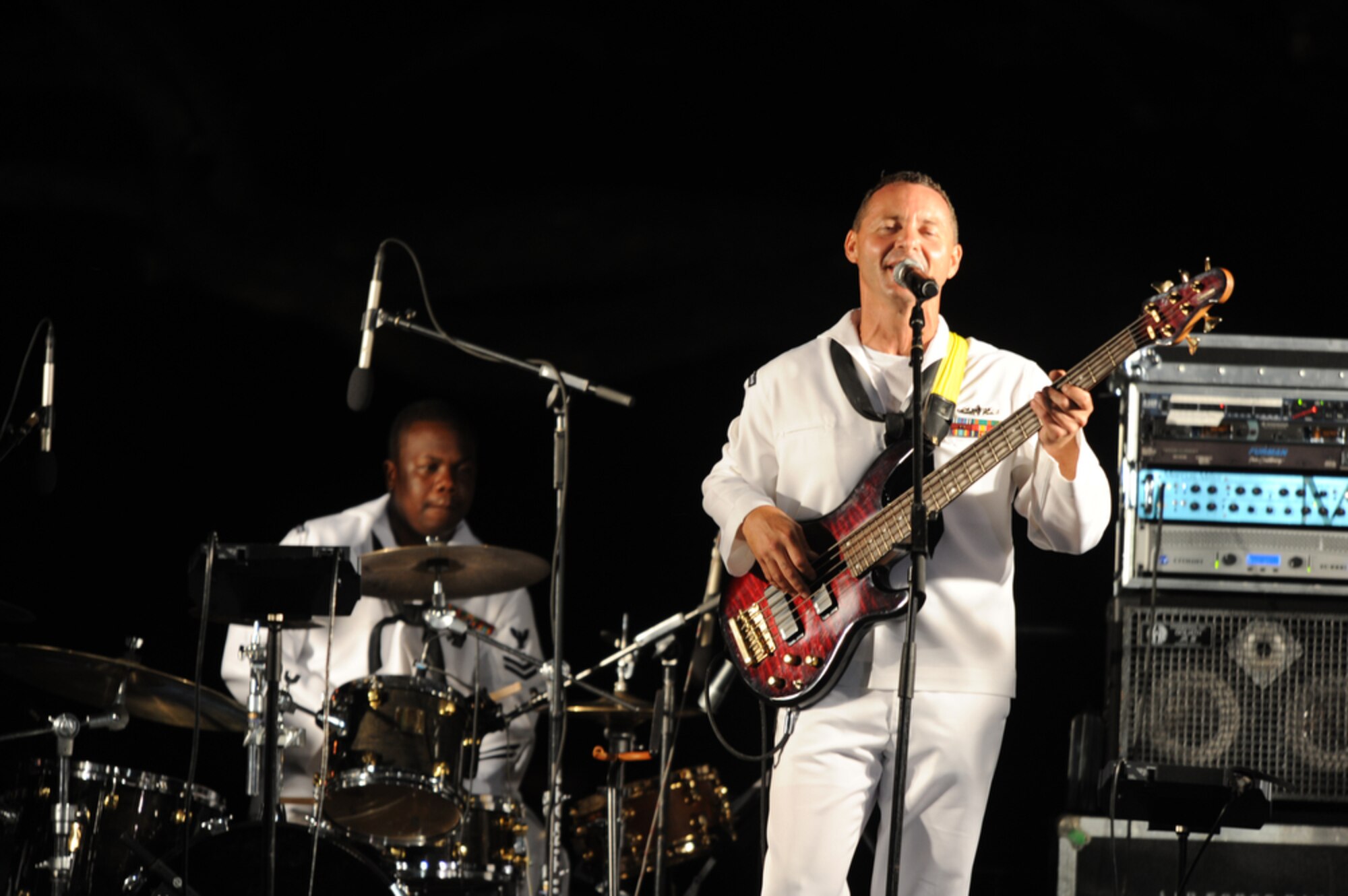 HONOLULU - The Pacific Fleet Rock Band performs in front of more than 400 onlookers during a Military Band Melee event at Ft DeRussy Park in Honolulu, Hawaii on May 29 as part of Military Appreciation Month and a prelude to Memorial Day events. The Marine Corps Forces Pacific Band, the 25th Infantry Division Band and the U.S. Air Force of the Band of the Pacific-Hawaii also performed. (U.S.  Air Force photo/Tech Sgt. Cohen A. Young)
