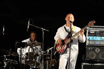 HONOLULU - The Pacific Fleet Rock Band performs in front of more than 400 onlookers during a Military Band Melee event at Ft DeRussy Park in Honolulu, Hawaii on May 29 as part of Military Appreciation Month and a prelude to Memorial Day events. The Marine Corps Forces Pacific Band, the 25th Infantry Division Band and the U.S. Air Force of the Band of the Pacific-Hawaii also performed. (U.S.  Air Force photo/Tech Sgt. Cohen A. Young)