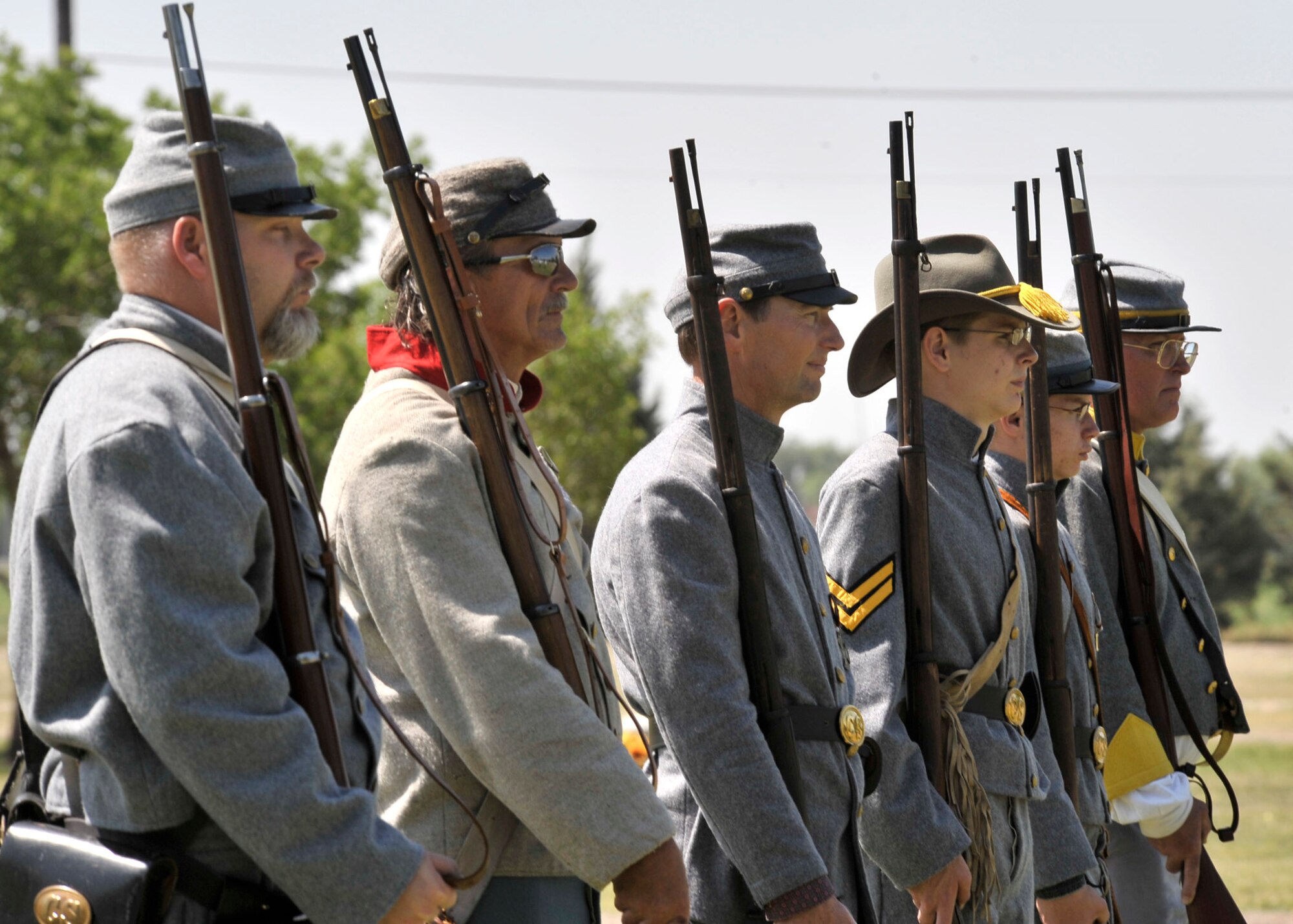 Members of the First Texas Brigade of the Sons of Confederate Veterans act as honor guard at the 64th Annual American Legion Memorial Day Ceremony at Portales Cemetery, May 31.  Memorial Day, formerly known as Decoration Day, was first enacted to honor those who died in the American Civil War.  It was extended after World War I to honor all Americans who have died in war.  (U.S. Air Force photo by Staff Sgt. Heather R. Redman)
