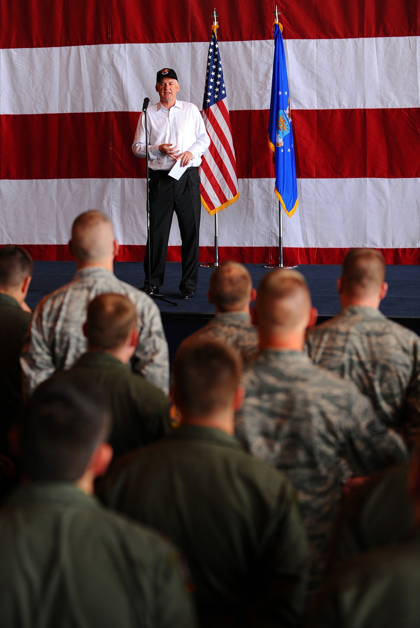 OFFUTT AIR FORCE BASE, Neb. -- Deputy Secretary of Defense William J. Lynn III, speaks to more than 300 members of the Fightin' Fifty-Fifth at Dock One of the Bennie Davis Maintenance Facility here May 26. During his speech, Mr. Lynn thanked Team Offutt for all they do to support contingency operations around the globe. Afterward, he personally thanked and met every Airman in attendance. U.S. Air Force Photo by Josh Plueger